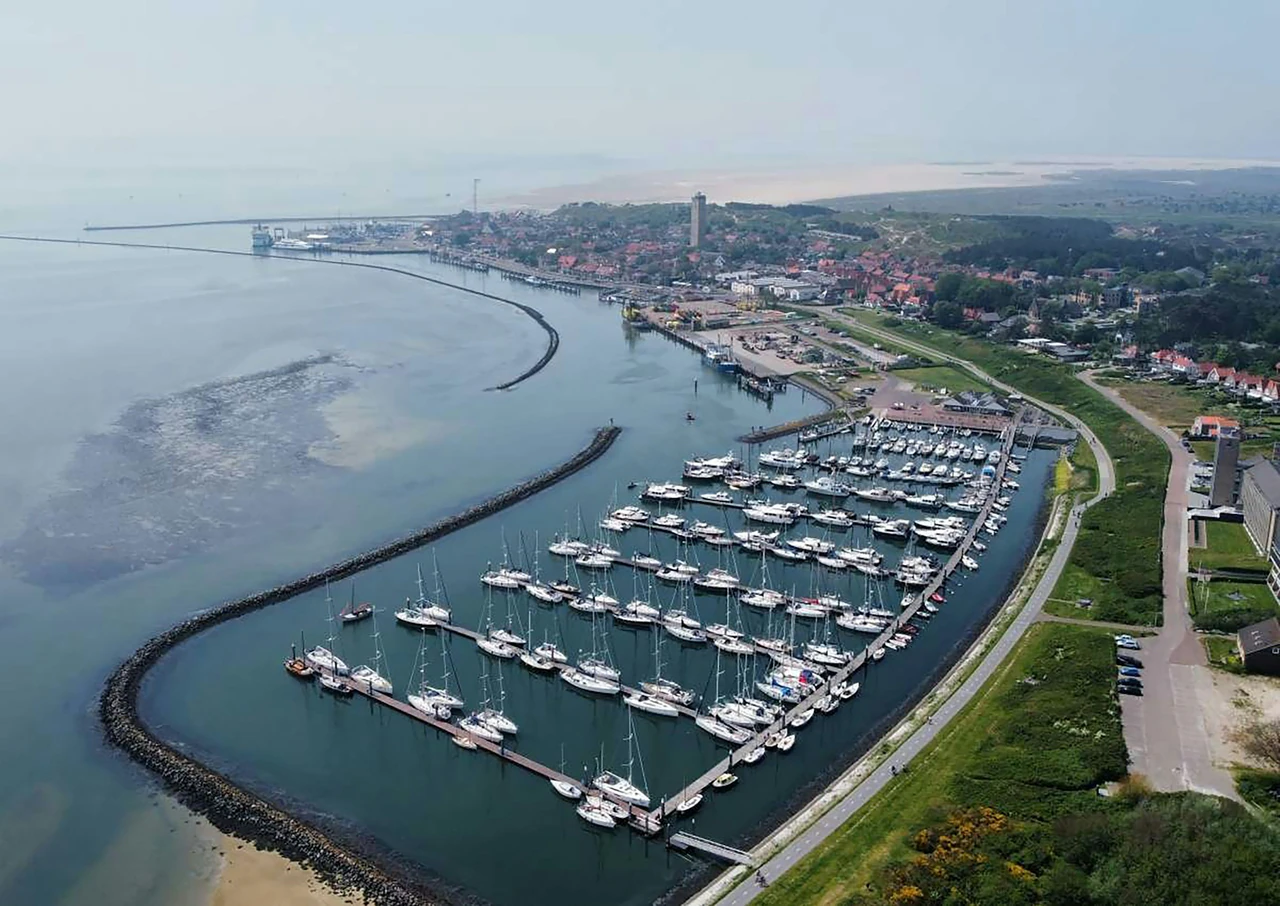 Yachts and boats in a marina, illustrating the marine operating environment.